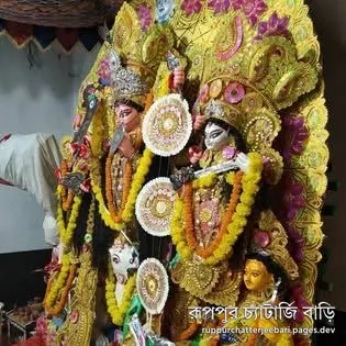 The sabeki ekchala pratima in golden saaj at Ruppur Chatterjee Bari